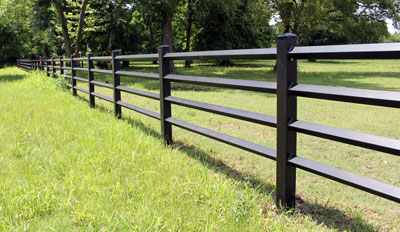A black fence made of square tubing.